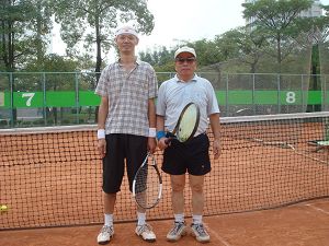 96年度網球會內賽-周技師與蔡技師比賽合影
